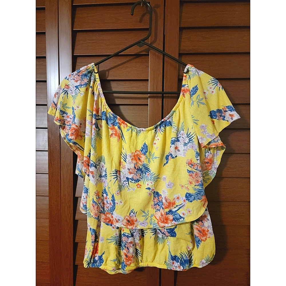 Yellow blouse with blue and pink floral designs